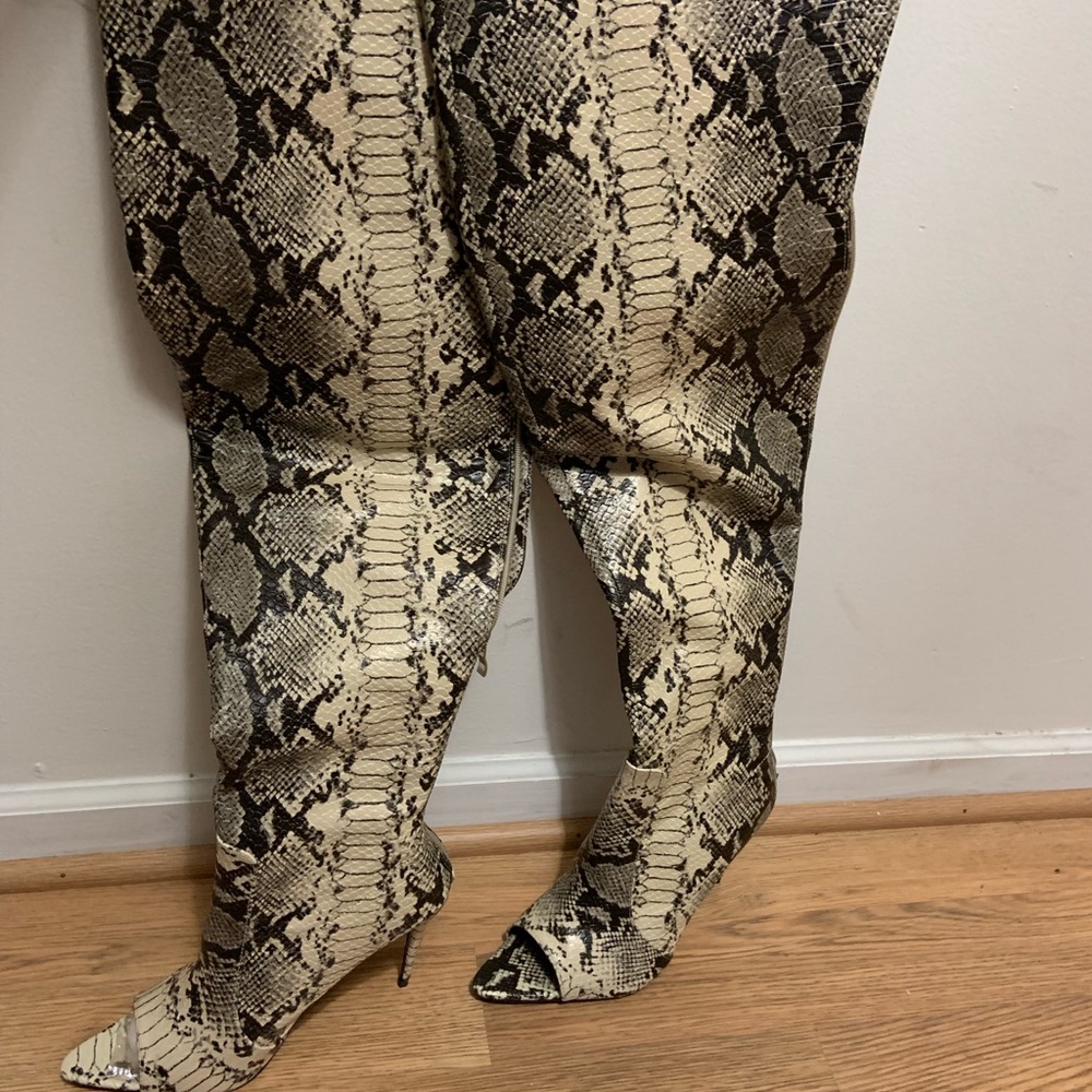 Thigh high snake skin peep toe boots